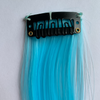Clip in blue hair extension. Measurements: 50cm x 3.5cm. Soft synthetic fibre hair.