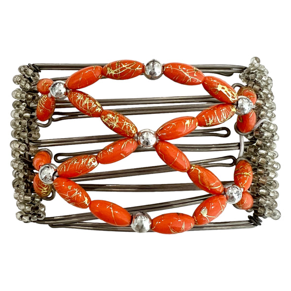 5 prong wire butterfly hair clip is silver in colour with coral beads and small silver ball centrepieces. Small clear beads are along both side edges. Beads are threaded on an elastic and attached to each clip.