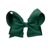 Dark green clip on bow for hair.