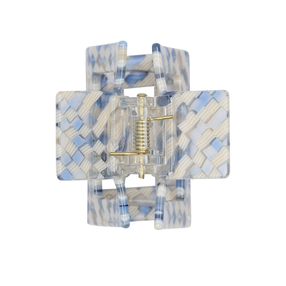 Image of small square hair claw with blue and white check pattern from above on white background