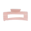 Image of peach midi hair claw on white background