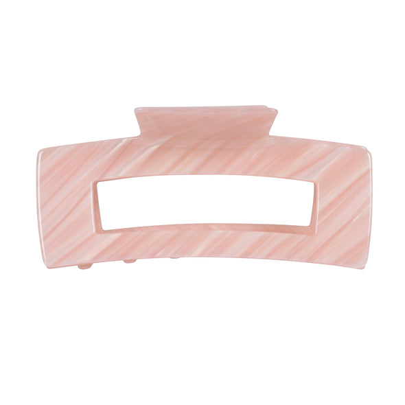 Image of extra large hair claw in peach on white background