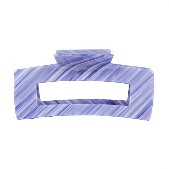 Image of extra large hair claw in lilac on white background