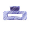 Image of mini purple hair claw on white background