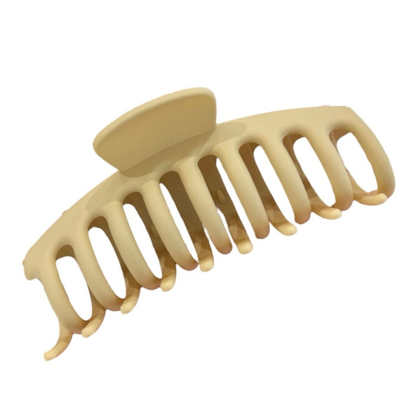 Large beige hair claw in matte acrylic.