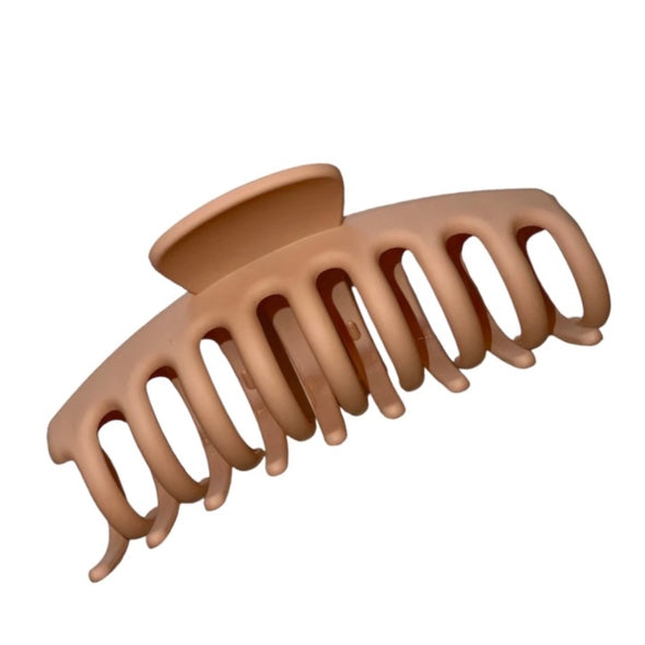 Large hair claw in tan made with matte acrylic.