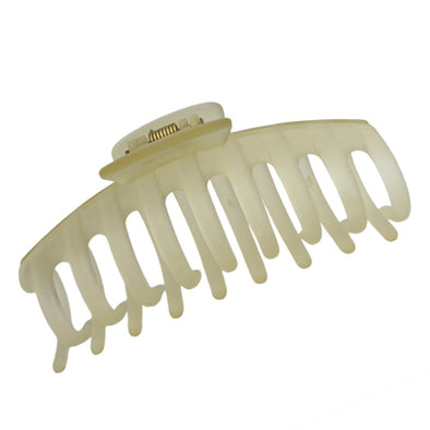 Translucent large hair claw in butter colour made with acrylic material.