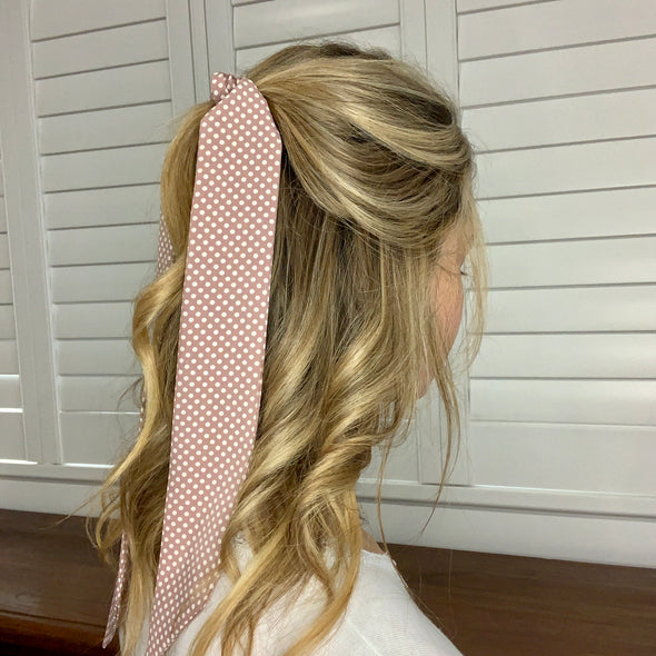 Girl wearing gorgeous dusty pink with mini white spot design hair scarf