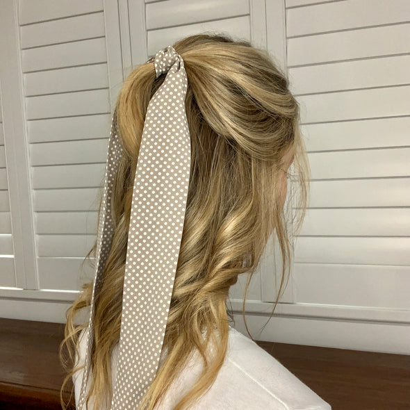 Girl wearing gorgeous beige/fawn colour with mini white spot design hair scarf
