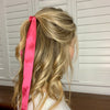 Girl wearing gorgeous pink hair scarf.