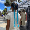 Girl wearing jumbo hair braid in navy, royal blue and light blue.