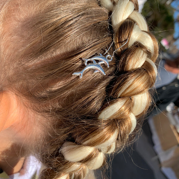 Girl wearing jumbo hair braid in blonde. Measurements: Each strand is 48 inches long.