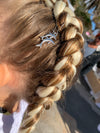 Girl wearing jumbo hair braid in blonde. Measurements: Each strand is 48 inches long.