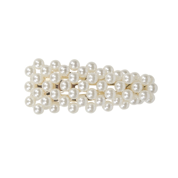 Gorgeous small pearl (faux) hair clip in gold setting.