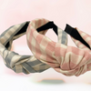 Top notch headband in light grey/blue/cream and pink/cream check pattern.
