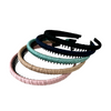 Lightweight headband with teeth to hair off your face. Headband colours in picture are pink, navy, spearmint, black and beige.