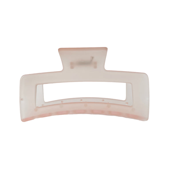 Jumbo translucent hair claw in apricot.