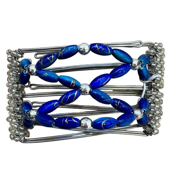 5 prong wire butterfly hair clip is silver in colour with royal blue beads and small silver ball centrepieces. Small clear beads are along both side edges. Beads are threaded on an elastic and attached to each clip.