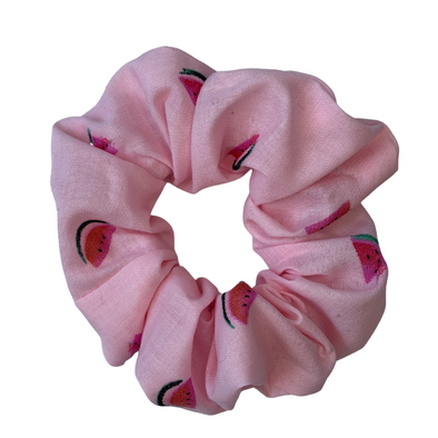 Pink - Melamelon Scrunchie. Colour/Pattern: Pink with pink watermelons (this is also available in yellow).  Material: Cotton polyester blend.  Dimensions: Material width approximately 4cm.  Made by us in Bondi Beach.