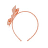 Apricot headband with bow.