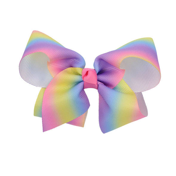 Rainbow coloured hair bow made with grosgrain ribbon.