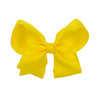 Yellow hair bow.