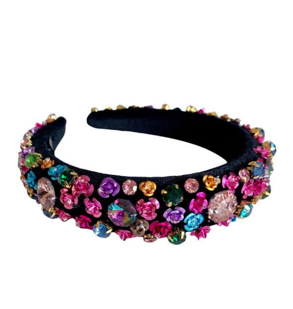 Headband on a black base with blue, pink, purple and yellow flower diamantes.