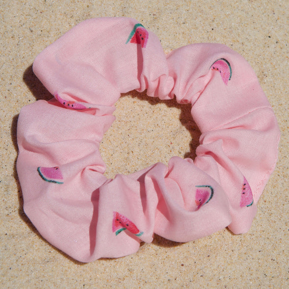 Pink - Melamelon Scrunchie. Colour/Pattern: Pink with pink watermelons (this is also available in yellow). Material: Cotton polyester blend. Dimensions: Material width approximately 4cm. Made by us in Bondi Beach.